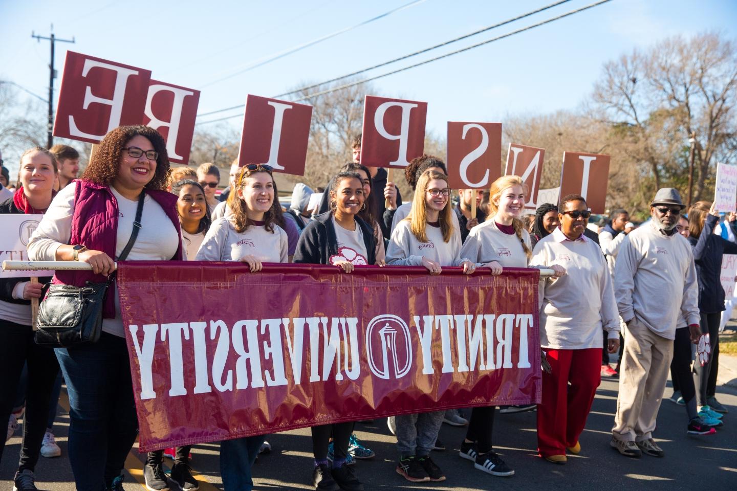 教师, staff, 和 students walkinging in MLK march